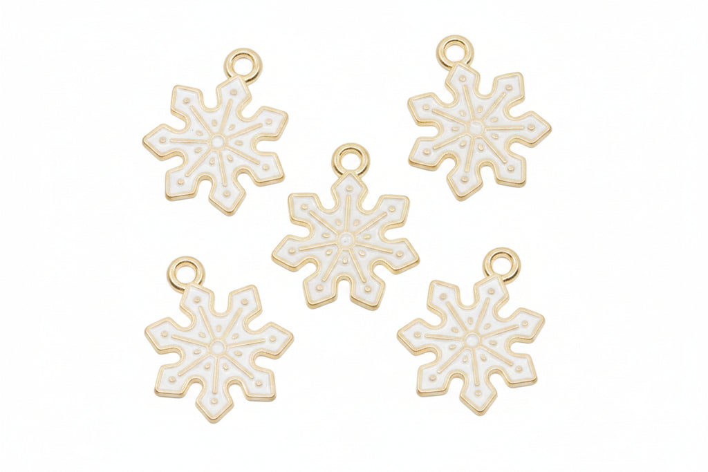 Five white snowflake-shaped jewelry charms with gold-tone loops at the top, arranged on a white background.