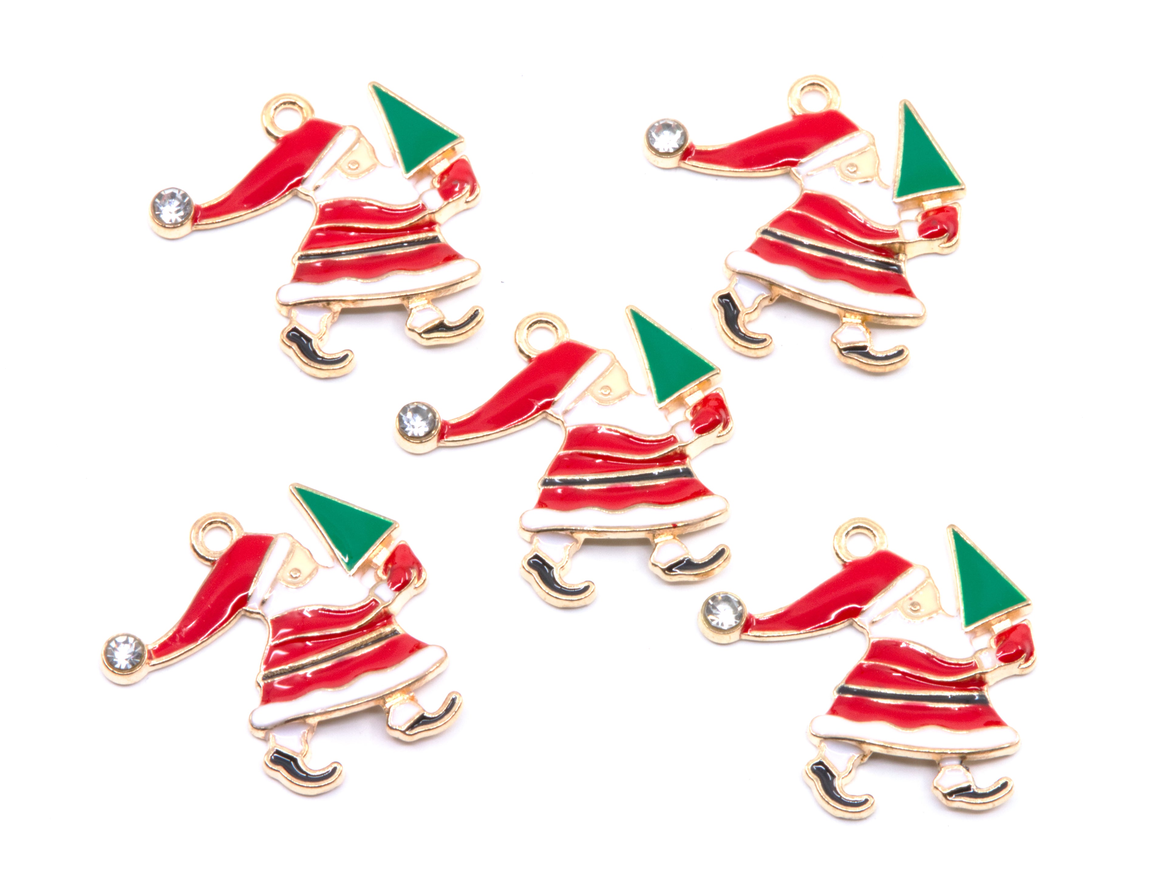Five Christmas-themed charms shaped like Santa Claus carrying a green tree, featuring red and white clothing on a white background. 