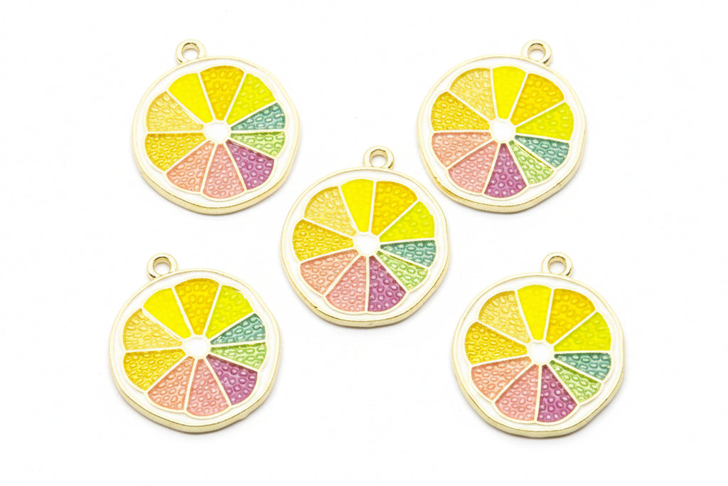 Five round enamel charms shaped like sliced citrus fruit, featuring yellow, green, pink, and purple segments with gold-tone metal borders on a white background.