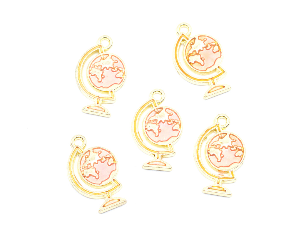 Five gold globe charms with light pink enamel details, arranged on a plain white background.