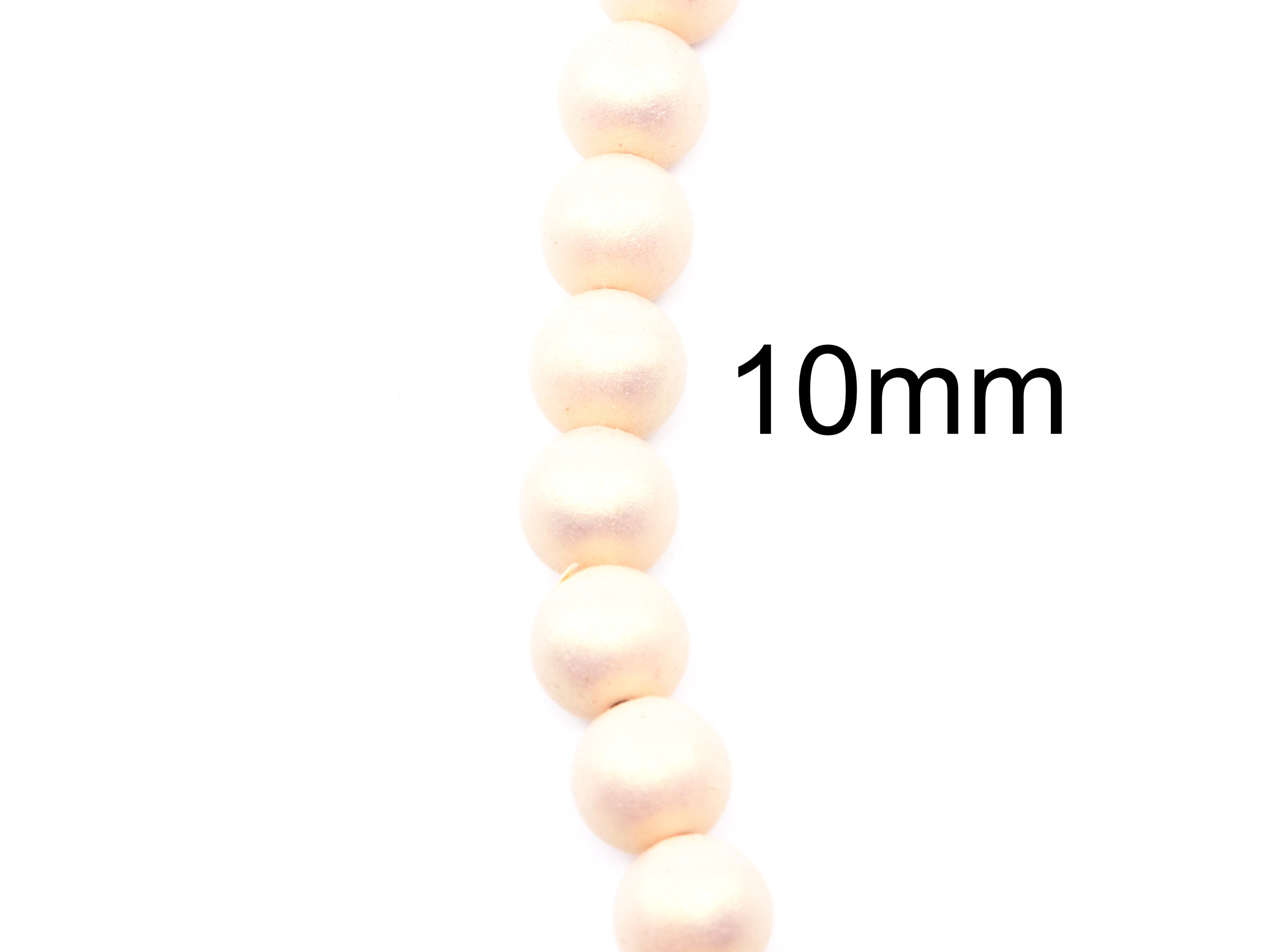 A close-up of a strand of shimmer peach colored  round acrylic beads with a '10mm' size indicator on a plain white background.