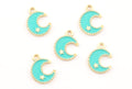 five blue crescent moon charms with a gold star detail displayed on a white background. 