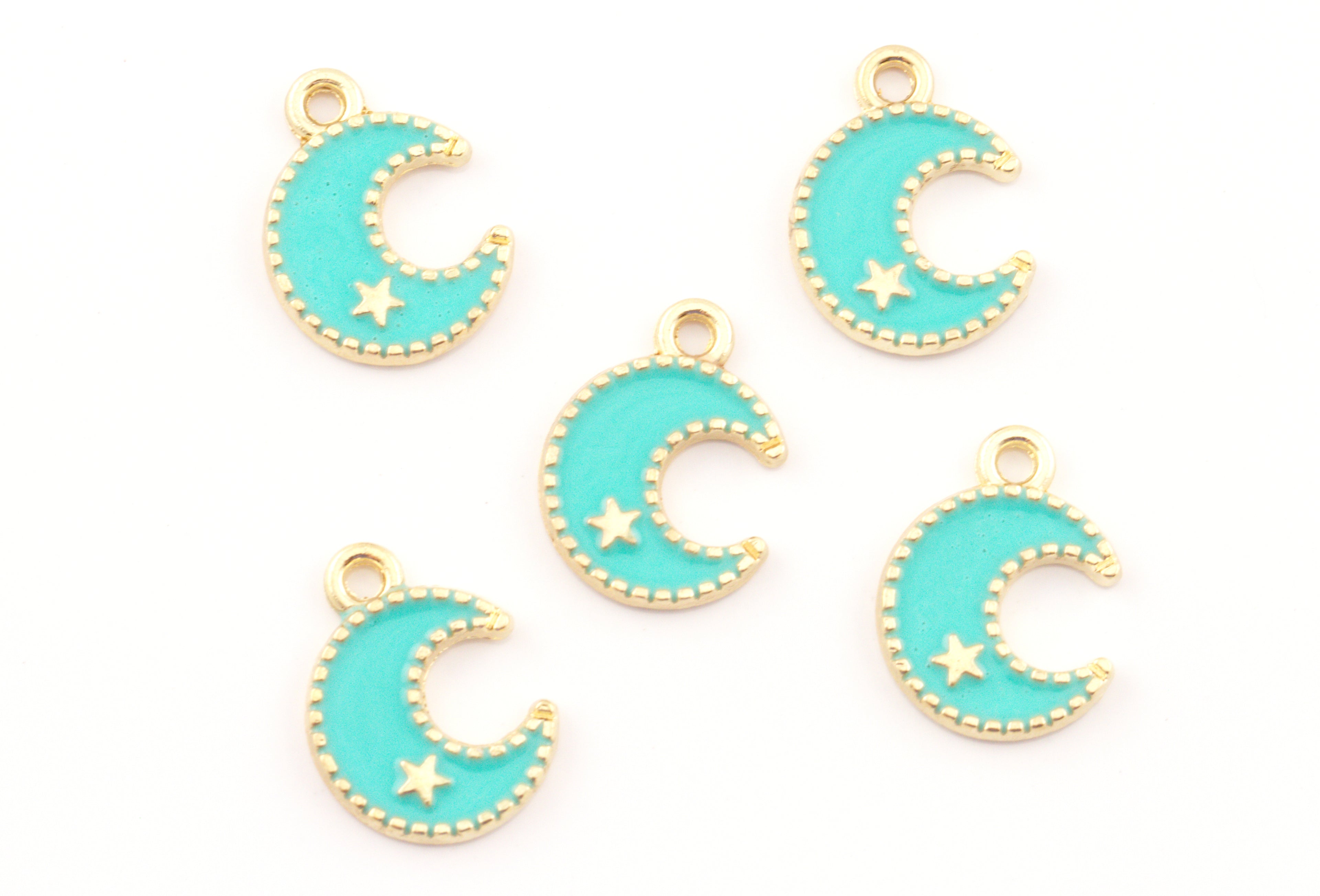 five blue crescent moon charms with a gold star detail displayed on a white background. 