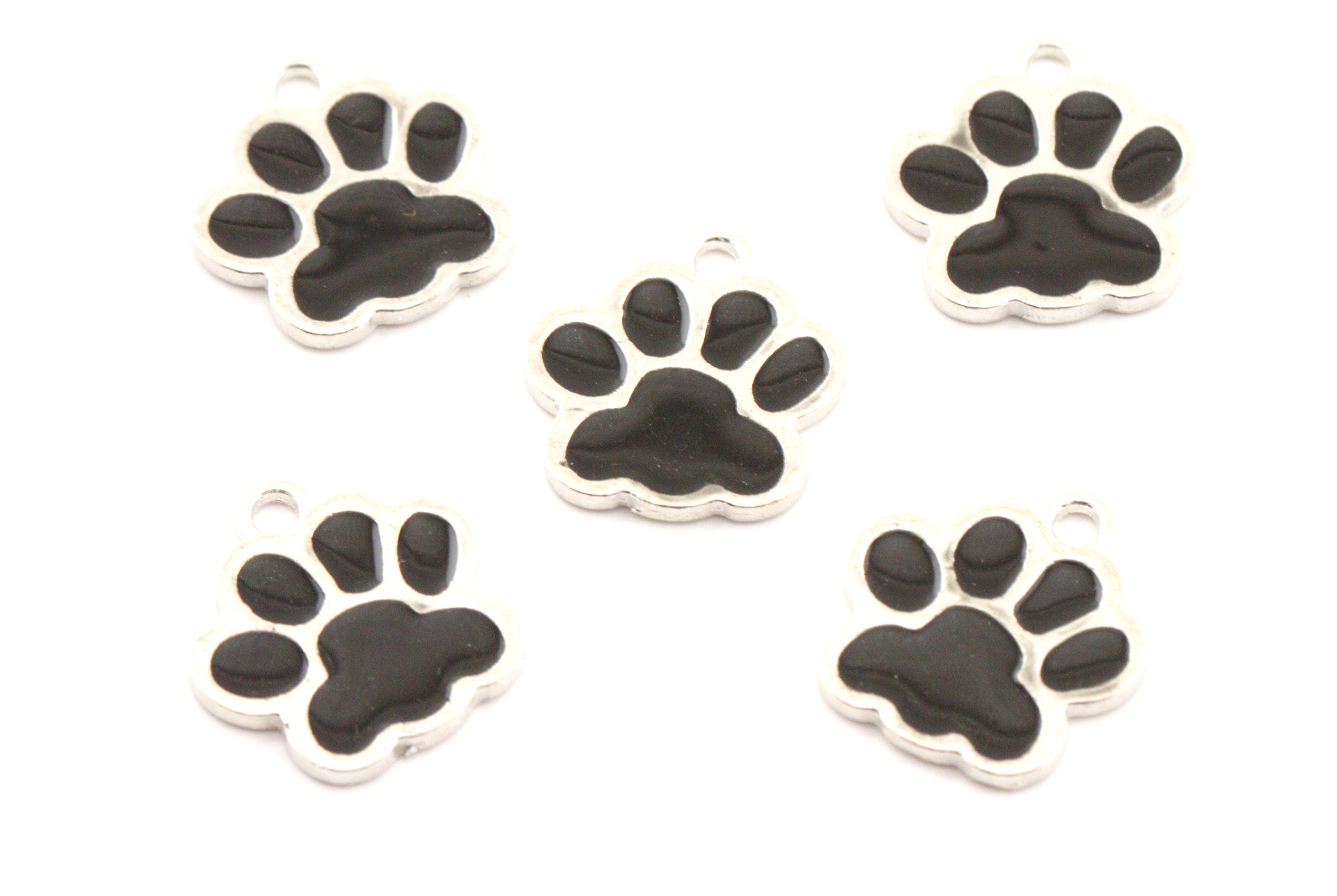 Five silver paw print charms with black enamel pads, arranged on a plain white background.