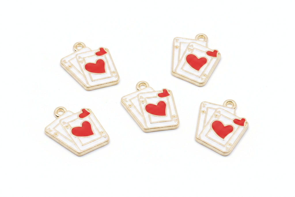 Five white and red playing card charms with red hearts, arranged on a white background. 