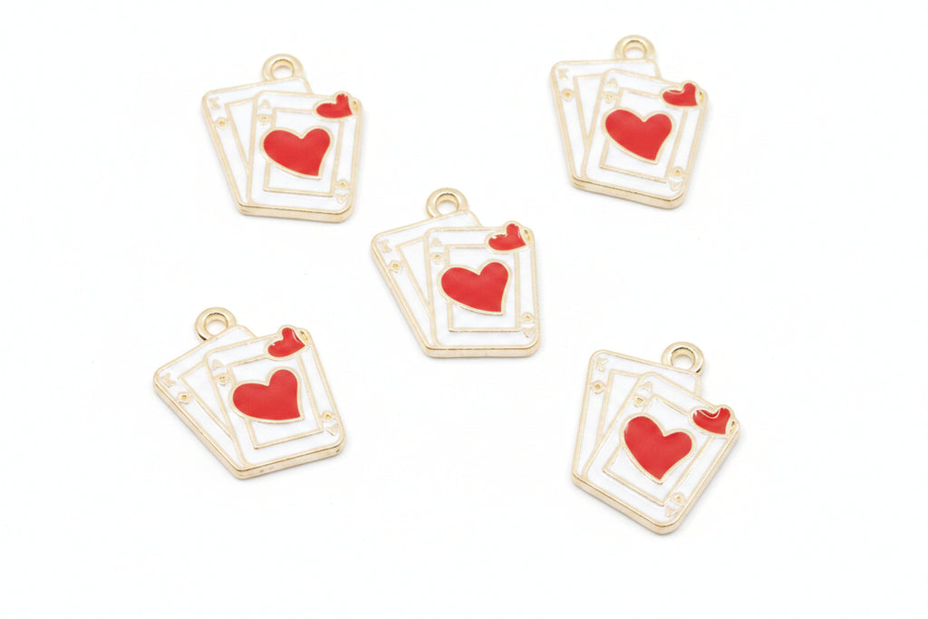 Five white and red playing card charms with red hearts, arranged on a white background. 