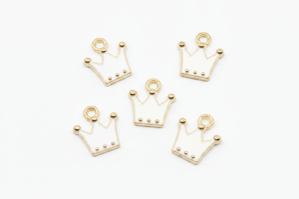 Five gold crown-shaped jewelry charms with small bead details, arranged on a plain white background.