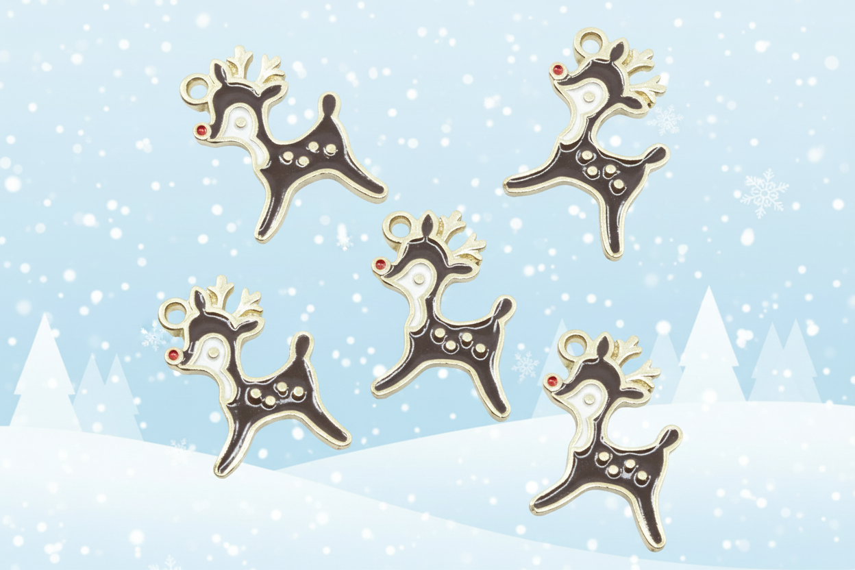 Five Christmas reindeer-shaped charms with brown enamel, gold outlines, white facial details, and red noses, arranged on a light blue snowy background with snowflakes and silhouettes of pine trees.