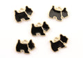 Five black and gold dog-shaped charms with small hanging loops, arranged on a plain white background.