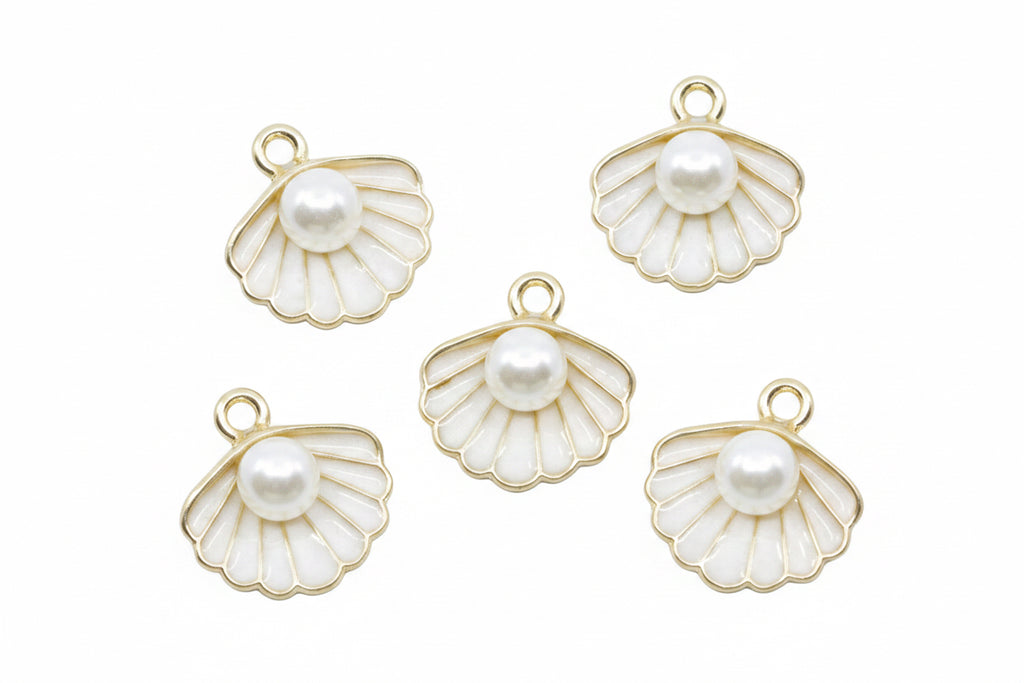 Five gold-plated white shell charms with white faux pearl centers, arranged on a white background.