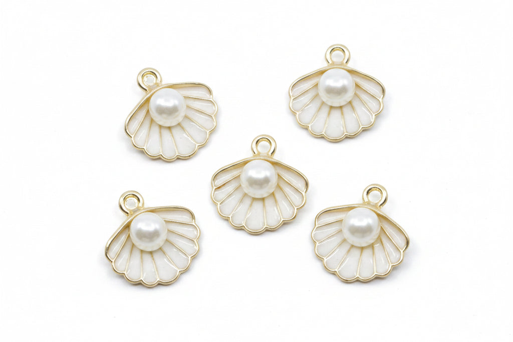 Five gold-plated white shell charms with white faux pearl centers, arranged on a white background.