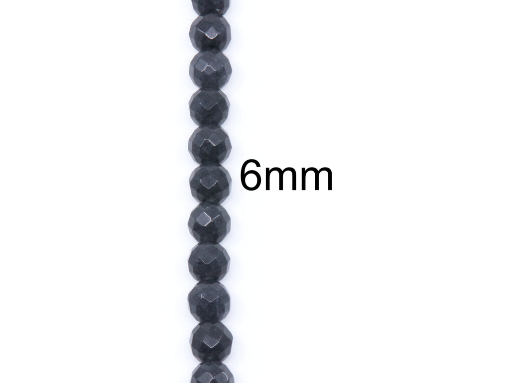 A single strand of faceted dark gray beads shown vertically on a white background, with the text '6mm' overlaid to indicate bead size.