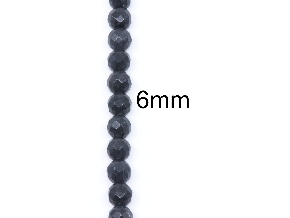 A single strand of faceted dark gray beads shown vertically on a white background, with the text '6mm' overlaid to indicate bead size.