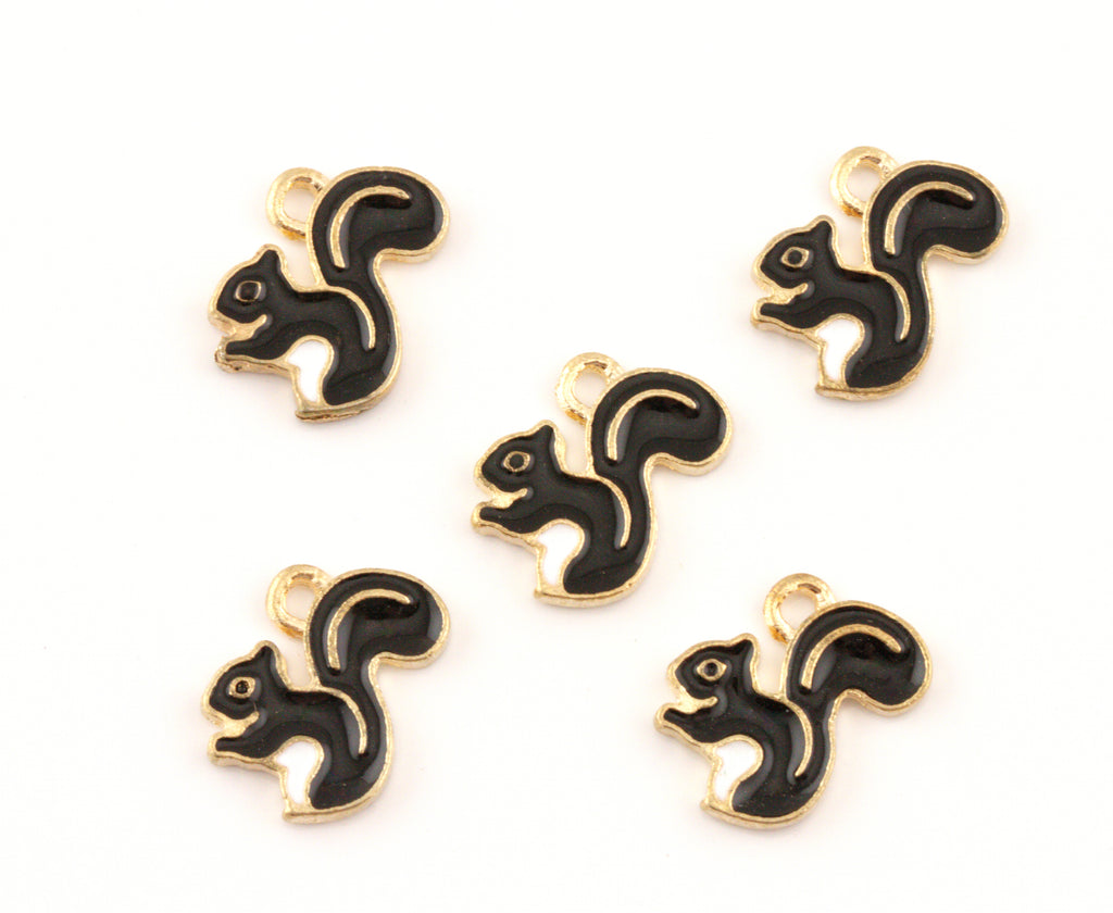 Five brown and gold squirrel charms arranged on a plain white background.