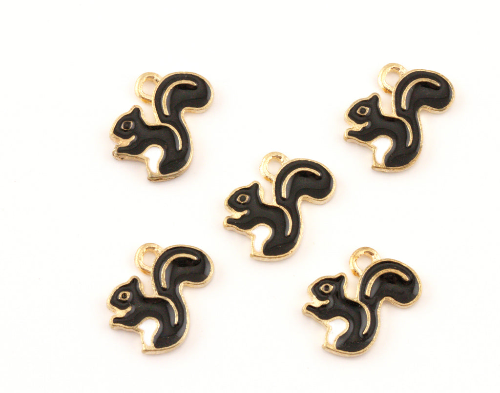 Five brown and gold squirrel charms arranged on a plain white background.