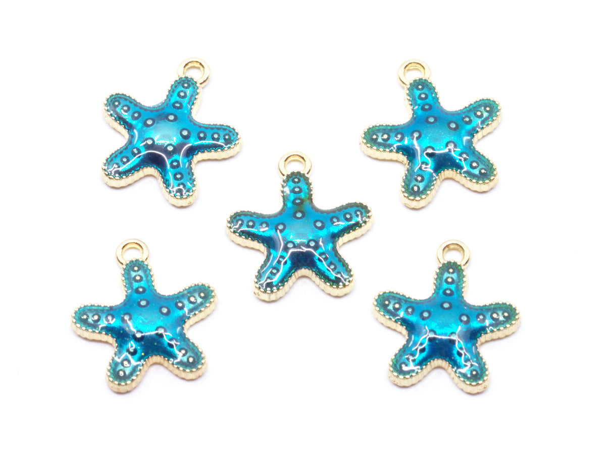 Five blue starfish charms with gold metal borders and loops, arranged on a plain white background.