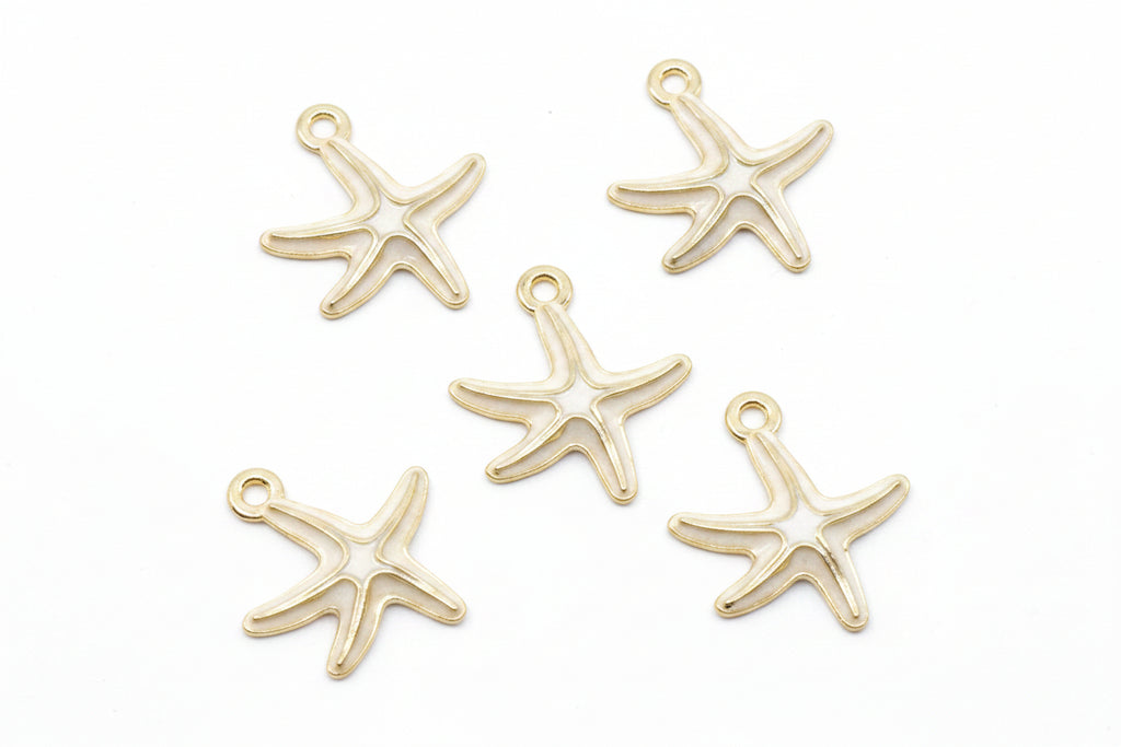 Five white and cream starfish-shaped jewelry charms arranged on a plain white background.