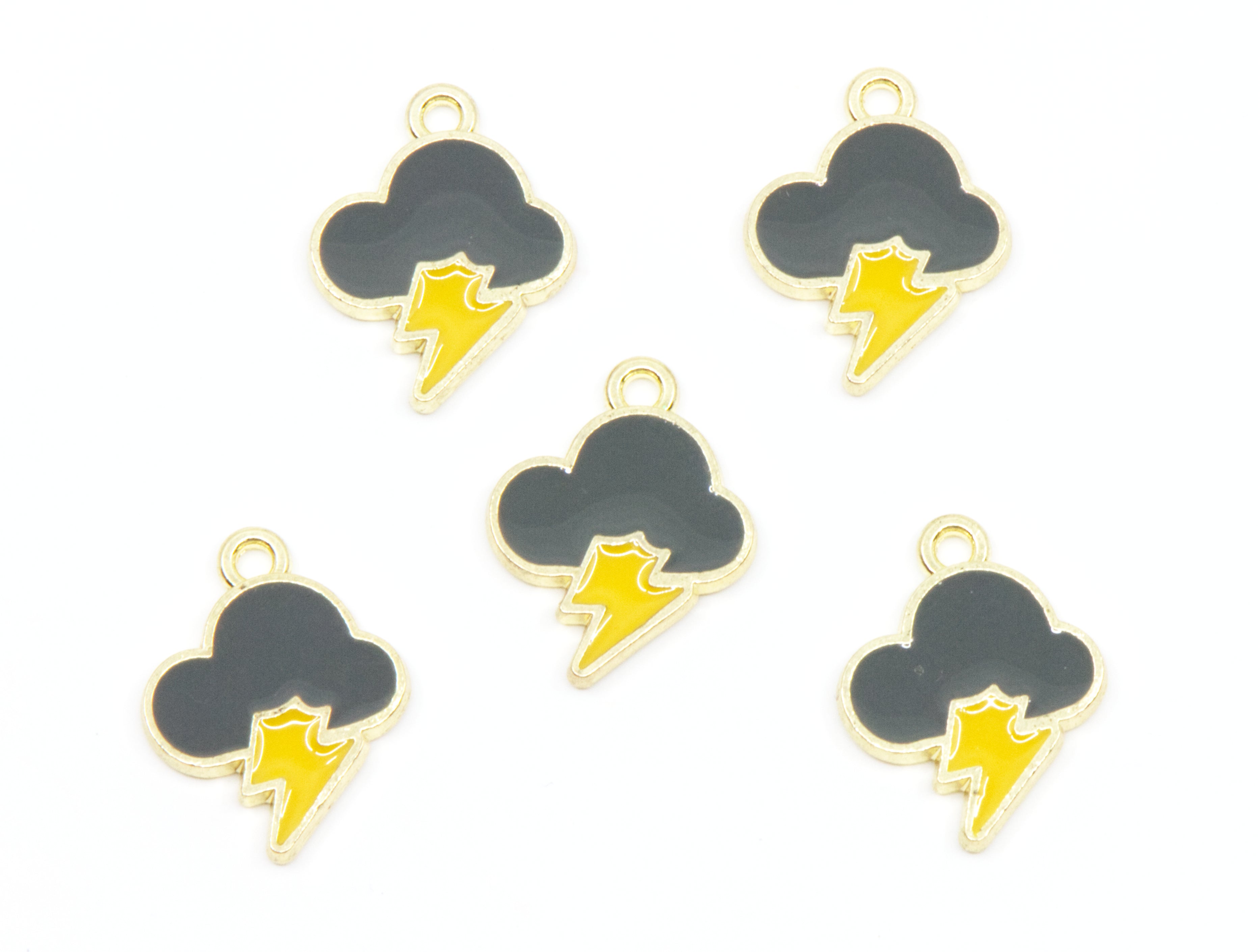 Five matching cloud and lightning bolt charms with gray enamel, yellow lightning bolts, and gold-tone metal borders, arranged on a plain white background.