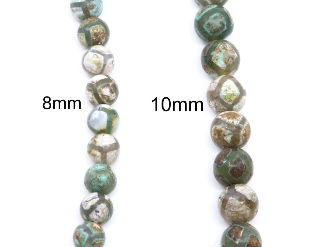 Two strands of round Tibetan agate  beads shown on a white background, labeled 8mm and 10mm, with the beads displaying a  green, brown, and gray pattern.