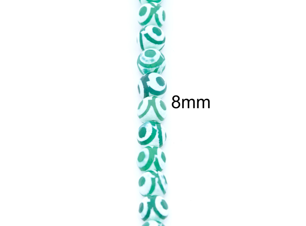 A vertical strand of small round Tibetan agate beads with a green and white spiral pattern on a white background, with the text '8mm' printed to the right indicating the bead size.