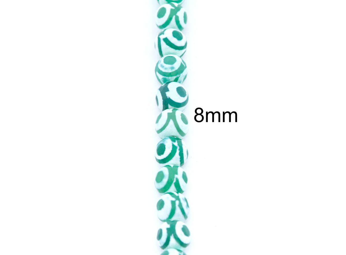 A vertical strand of small round Tibetan agate beads with a green and white spiral pattern on a white background, with the text '8mm' printed to the right indicating the bead size.