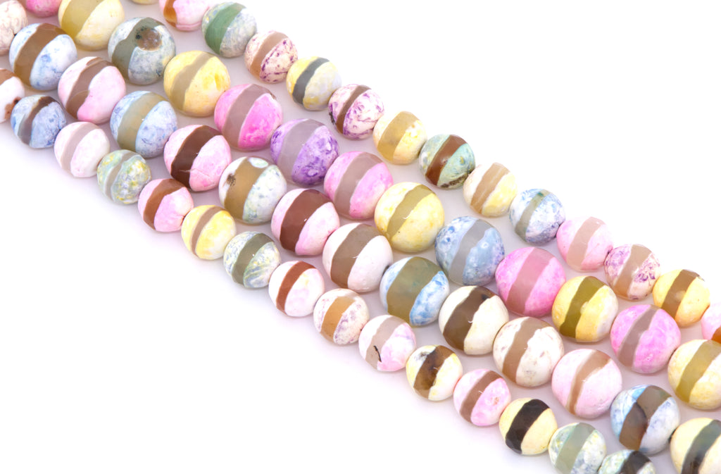 Four strands of round stripe Tibetan agate  beads in pastel colors, including pink, yellow, blue, brown, and white, arranged diagonally on a white background.