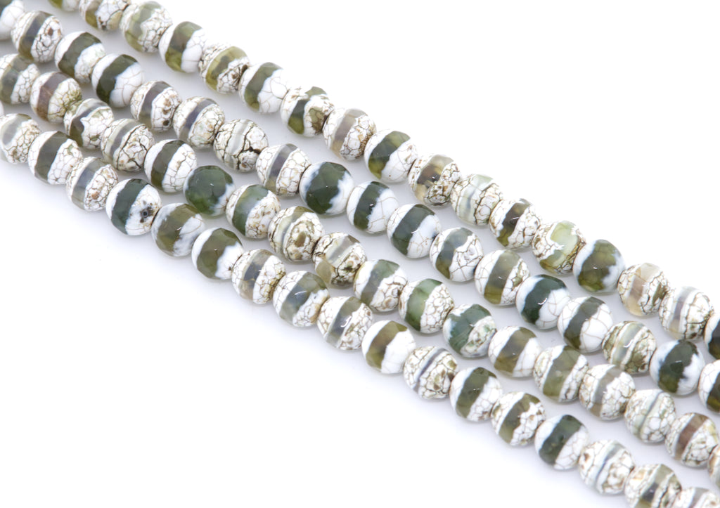 Four strands of round Tibetan agate beads with a distinctive white and green banded pattern, set against a plain white background.