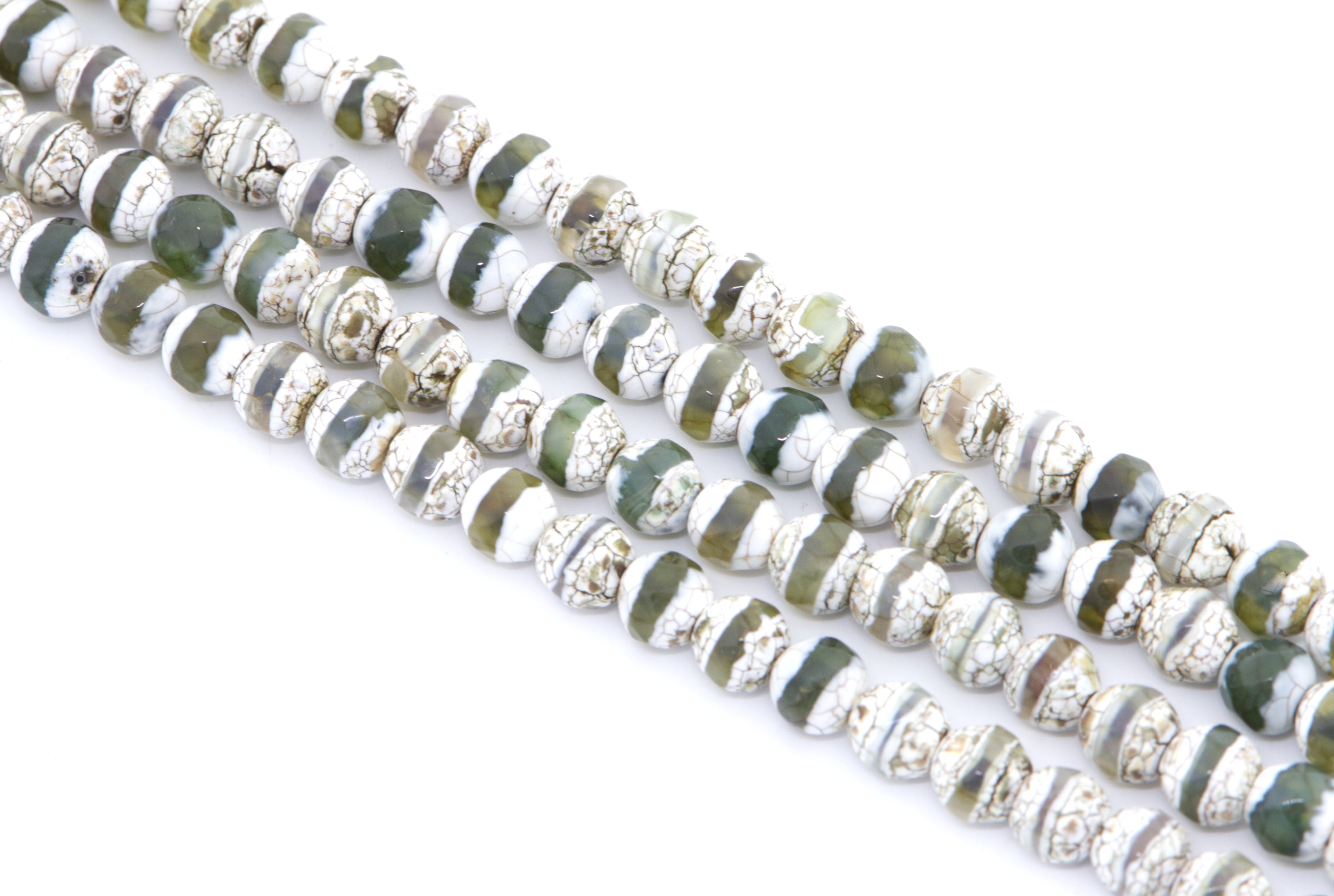 Four strands of round Tibetan agate beads with a distinctive white and green banded pattern, set against a plain white background.
