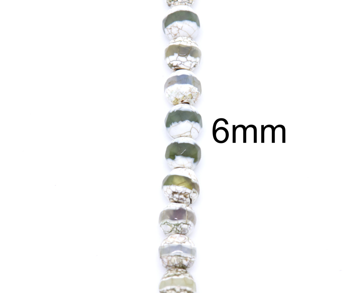 A close-up vertical shot of a string of round Tibetan agate beads on a white background, with the text '6mm' printed to the right to indicate the bead size.