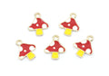 Five small mushroom-shaped charms with red and white spotted caps and yellow stems, outlined in gold-tone metal, arranged on a plain white background.