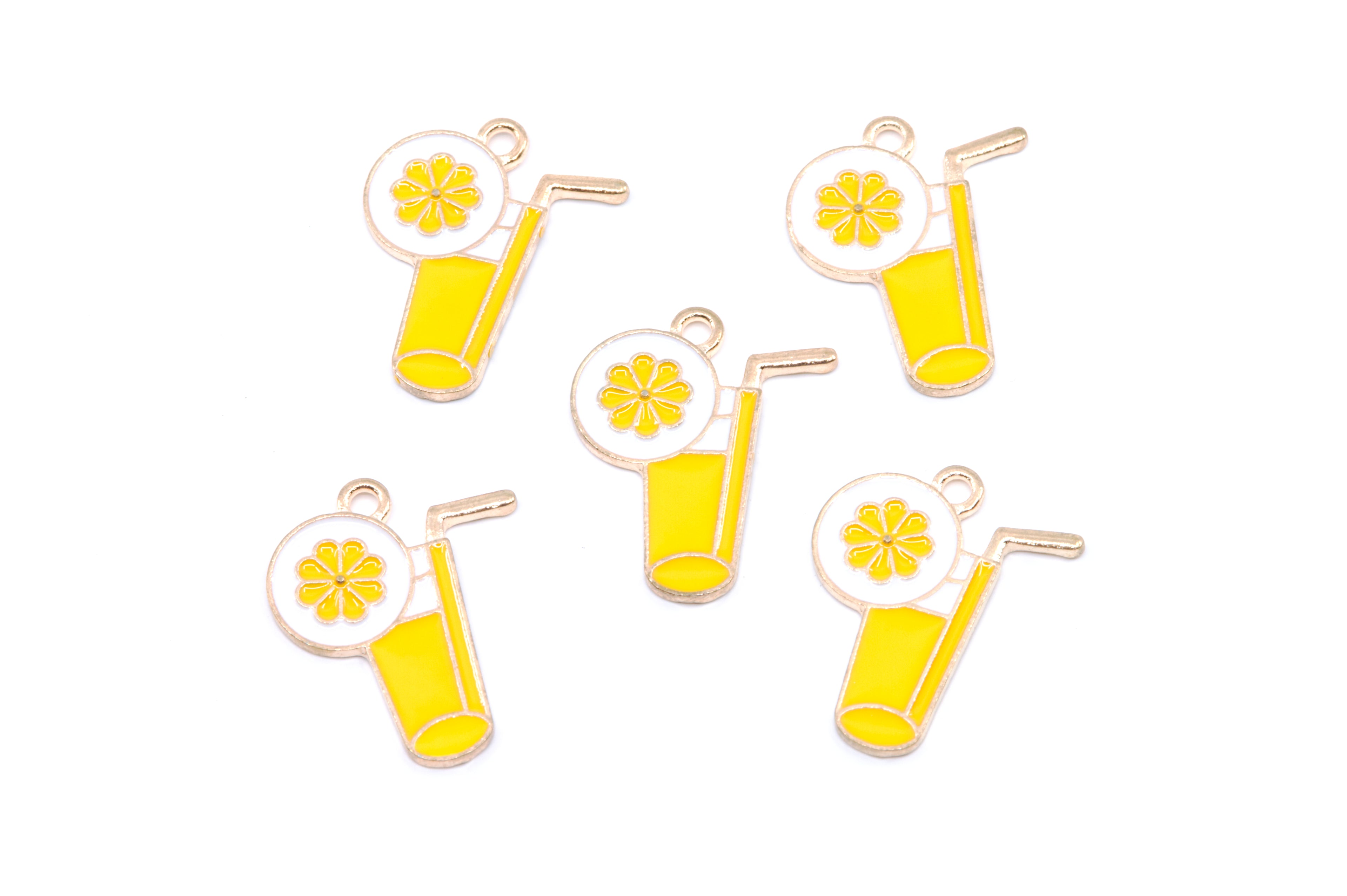 Five enamel charms shaped like yellow lemonade glasses with straws, garnished with a lemon wheel, arranged on a plain white background.