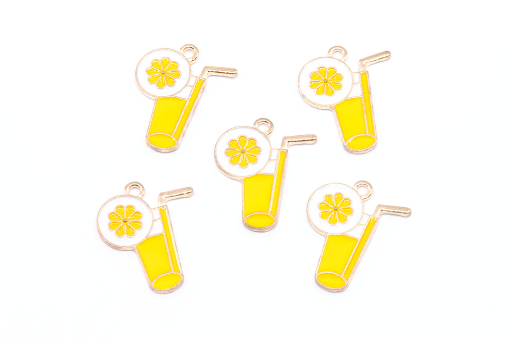 Five enamel charms shaped like yellow lemonade glasses with straws, garnished with a lemon wheel, arranged on a plain white background.