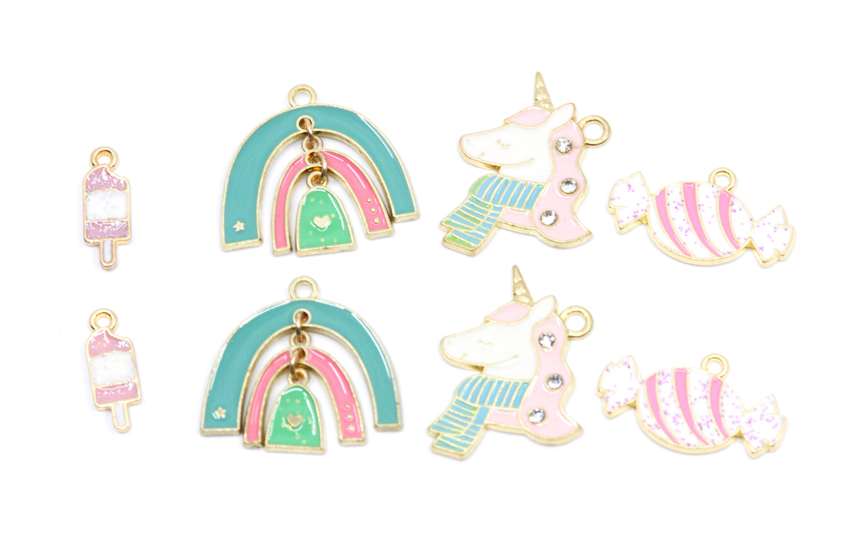 A set of pastel-colored enamel charms on a white background, including two rainbow charms, two unicorn charms, two ice cream bar charms, and two candy charms.