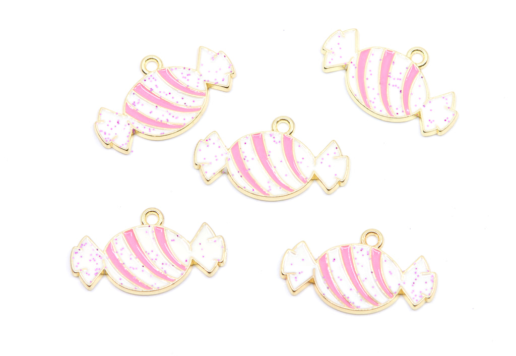 Five candy-shaped charms with pink and white stripes and glitter, outlined in gold, arranged on a plain white background.