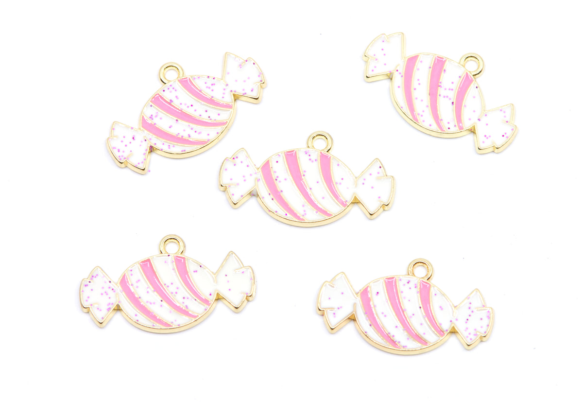 Five candy-shaped charms with pink and white stripes and glitter, outlined in gold, arranged on a plain white background.