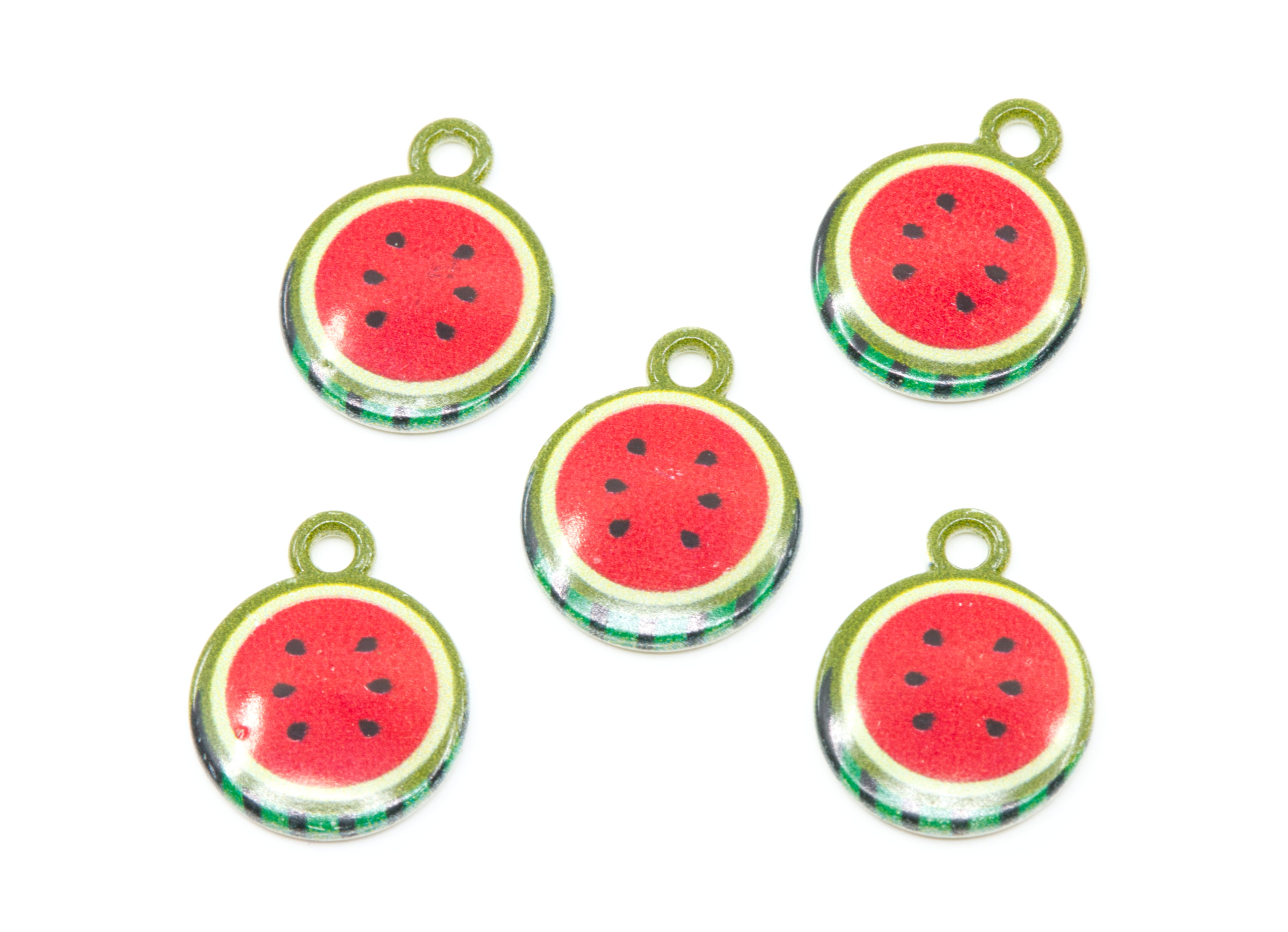 Five round watermelon-themed charms with hanging loops, featuring red centers, black seeds, and green rinds on a white background.