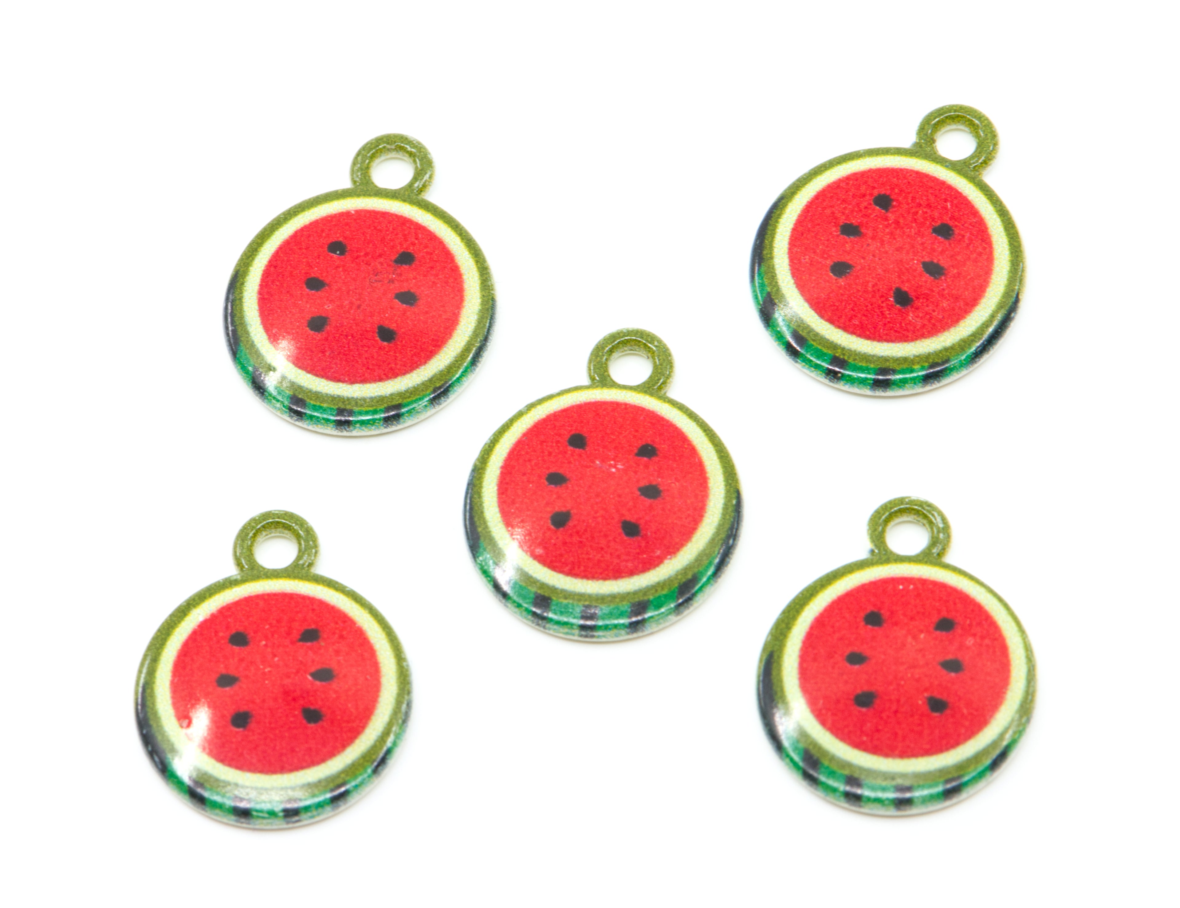 Five round watermelon-themed charms with hanging loops, featuring red centers, black seeds, and green rinds on a white background.